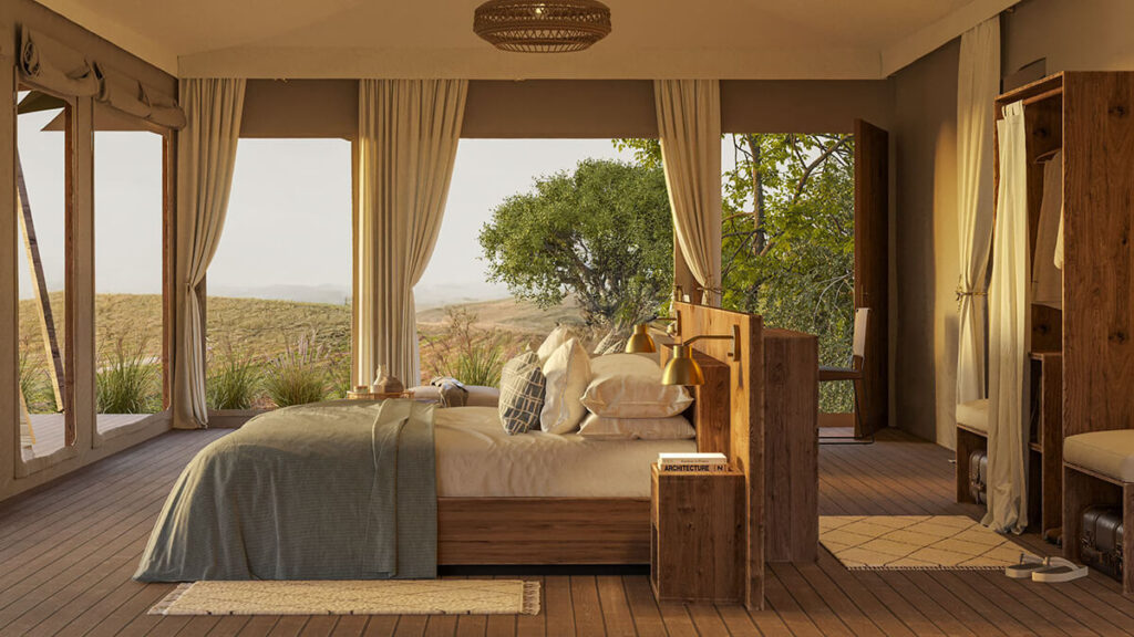 Spacious bedroom inside a luxury tent at Little Enkewa, featuring panoramic views and handcrafted wooden decor.