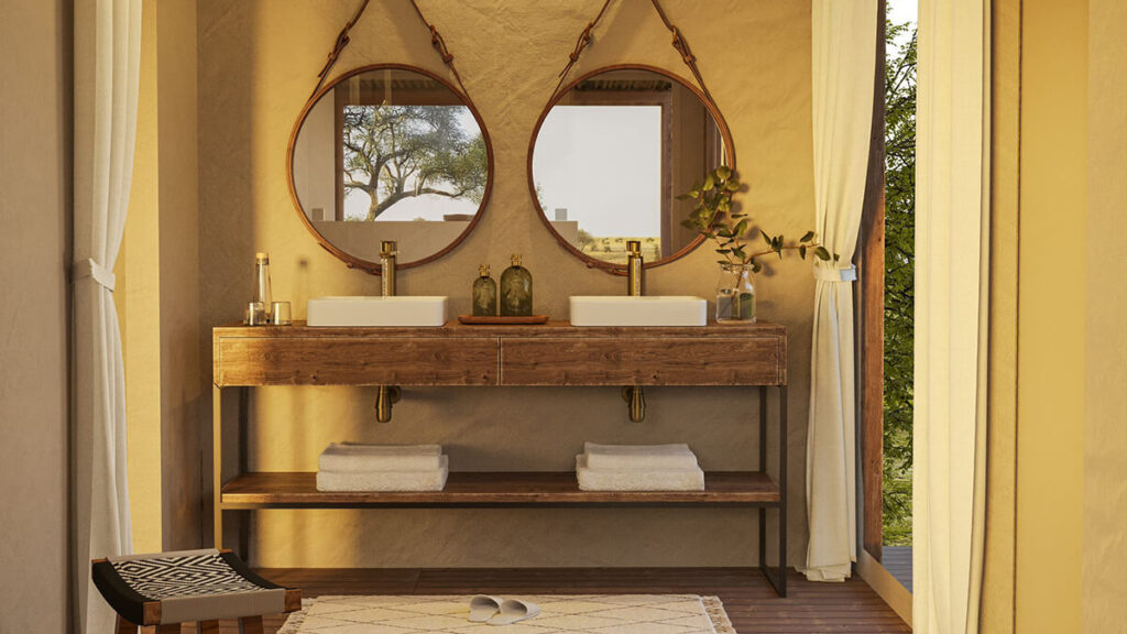 Bathroom of a Little Enkewa tent with twin basins, natural materials, and elegant details.
