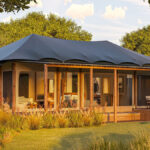 Exterior view of a luxury tent at Little Enkewa, blending refined design with the natural surroundings of the Masai Mara.