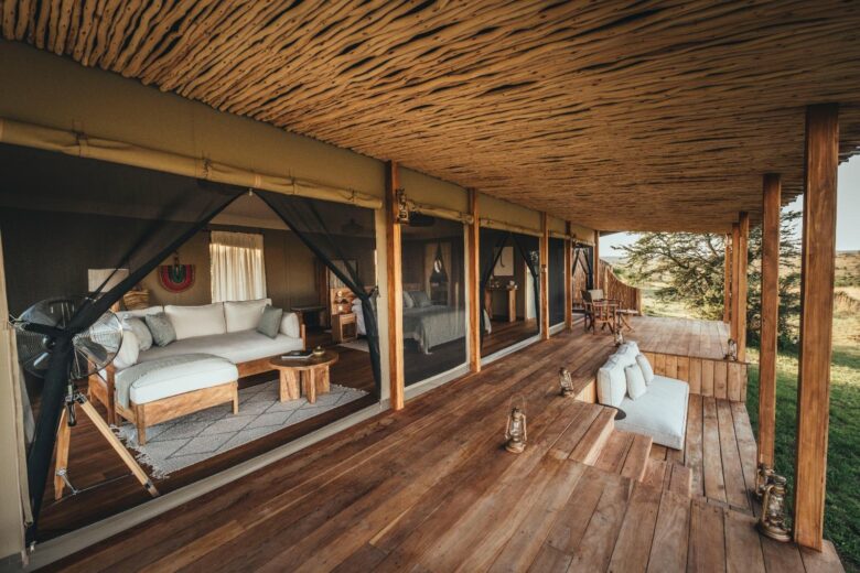 Private veranda at Little Enkewa independent luxury safari tent in the Masai Mara overlooking the savannah
