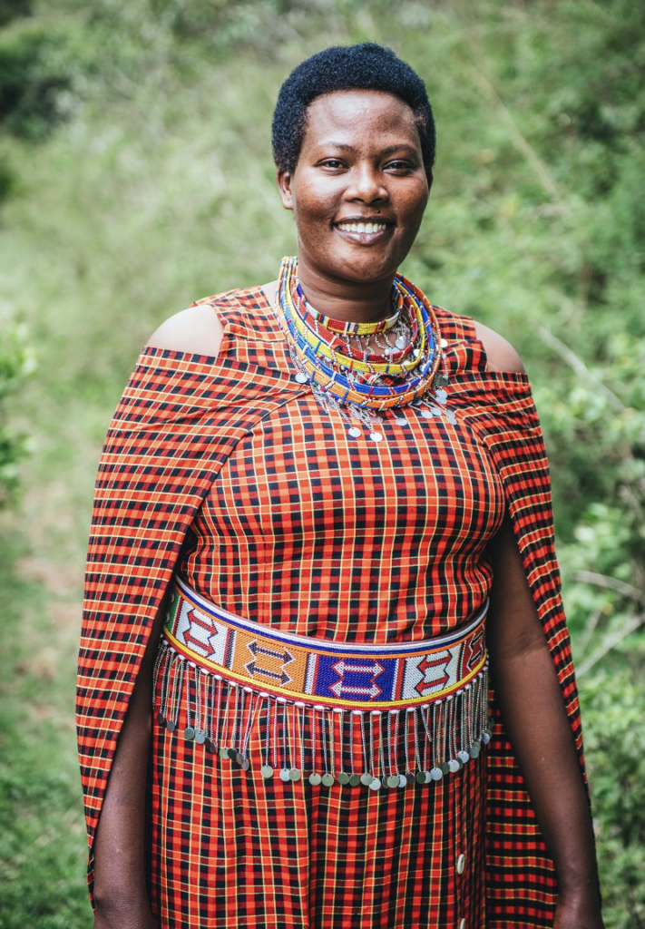 Portrait of a Maasai woman near Enkewa Camp in the Masai Mara. Team member.