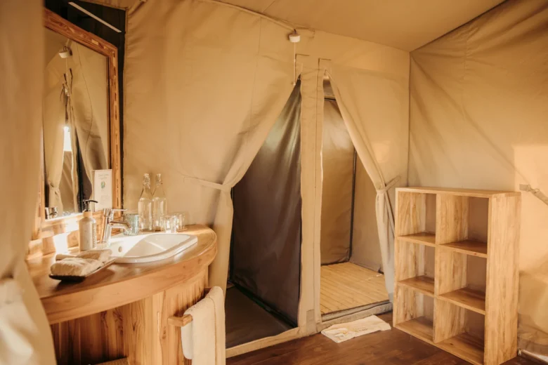Double tent at Enkewa Camp – en-suite bathroom with wooden vanity