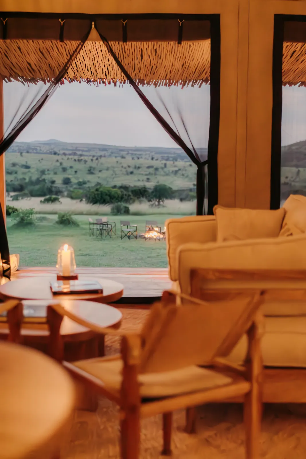 Candlelit evening lounge at Little Enkewa overlooking the plains
