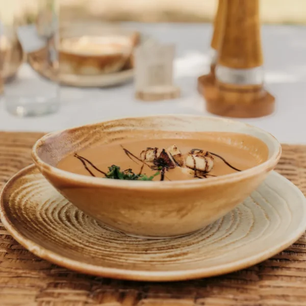 Soup served at Little Enkewa on a table overlooking the savannah