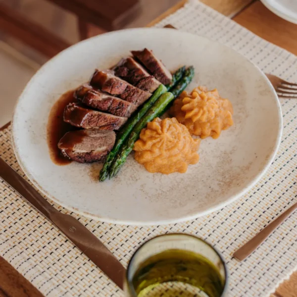 Grilled beef with sweet potato purée and green beans at Little Enkewa